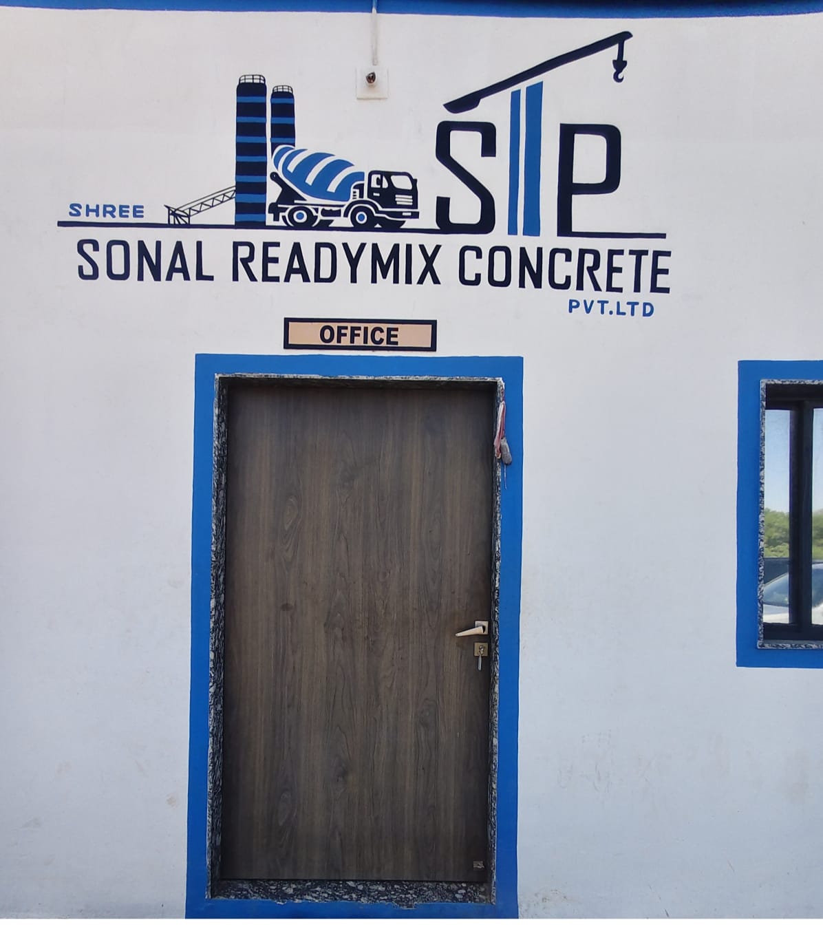 Office door under the Shree Sonal Readymix Concrete name and logo